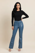 Blue jeans on a plain background